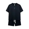 Conjunto de Verano Nuevo de Color Sólido con Media Cremallera y Remaches, Manga Corta y Shorts para Hombre, Marca de Moda, Conjunto Casual Holgado de Dos Piezas