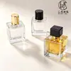 En stock en varios tamaños: Botella de Perfume Transparente Cuadrada, Botella con Atomizador Minimalista de Alta Gama, Botella de Vidrio con Pulsador para Uso Diario