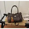 Bolso de Mano Tote de Lujo Retro para Mujer 2026 Nuevo Pequeño de Nicho para el Trabajo Casual Versátil Bolso Cruzado