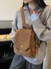 Mochila de Lona Transfronteriza para Mujer 2025 Nueva de Viaje Ligera Gran Capacidad Volteo Mochila Pequeña Simple Estudiante Bolsa Escolar