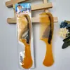 Peine para el cabello con imitación de tendón de res M13 21cm color mixto plástico amarillo para el hogar peine 1 yuan 2 yuanes suministro al por mayor artículos pequeños
