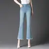 Pantalones cortos de mezclilla 2012 nuevos 2025 elástico elástico ajustados que cubren la piel ajustados borde crudo moda pantalones acampanados de nueve puntos