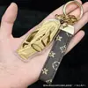 Llavero de Gato Hello Kitty Lindo Colgante Kt Cadena de Teléfono Móvil de Oro Puro Colgante para Bolsa de Lista Dorada Coche