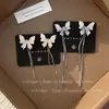 Pendientes de Borla de Cristal de Mariposa de Hada Súper Pendientes de Moda para Vacaciones en la Playa Lujo Ligero Pendientes de Nicho Sentido Avanzado Pendientes Exquisitos