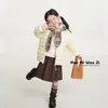 Chamarra de plumas para niños Nuo Mi Wanzi 2026 nuevo estilo de invierno 95% plumón de pato blanco ligera con capucha abrigo cálido resistente al agua