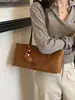 Bolso vintage de gamuza para mujer, nueva moda de otoño 2026, bolso tote de alta gama para el trabajo, bolso de hombro de gran capacidad