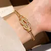 Pulseira de Ferradura Europeia e Americana Transfronteiriça com Zircônia Redonda Envolvida, Pulseira Personalizada Elegante e Exquisita, Joia de Luxo Leve e de Alta Qualidade