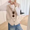 Chaleco de punto con capucha para mujer, nuevo estilo otoño/invierno 2026, prenda exterior de corte holgado, chaleco suéter para superponer, moderno