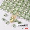 Diamante boutique de cristal k9 especial con fondo puntiagudo verde, súper brillante, cuadrado gordo, corazón torcido de almohada, amor, cruzado, joyería para uñas al por mayor
