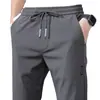Pantalones de Hielo Finos de Talla Grande para Hombre de Verano Transpirables Casuales Deportivos Versátiles Ajustados de Secado Rápido Pierna Recta