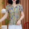 Camisa Feminina Original Atacado Venda Quente Verão Gola V Slim Fit Manga Curta, Estampa Floral Estilosa, Top Versátil Redutor de Idade