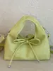 Bolso de mujer de nicho minimalista estilo coreano modelo 2026, bolso cruzado de moda, alto atractivo estético, bolso de mano casual moderno, bolso tipo dumpling