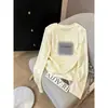 Estilo nuevo 2026, corte regular, algodón con diseño de copo de nieve, cuello redondo, manga larga, camiseta para mujer, moderna y versátil, capa interior blanca, estilo fino de otoño