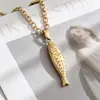 Yan Bai Oumei Estilo Playa Colgante de Pez Pequeño de Doble Cara Collar Versátil Pez Tridimensional Suéter Collar de Oro Joyería al por Mayor