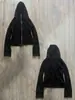 Sudadera con capucha y cremallera corta de subcultura americana para mujer con ojales metálicos y cordón, corte ajustado, chaqueta corta de chica popular para principios de otoño