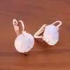 Venta caliente transfronteriza aretes de zirconita redondos de 12 mm aretes de moda europea y americana de alto sentido para el verano pendientes 2024