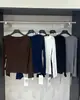 Top de punto con diseño de cinta fluida, manga larga, adelgazante, versátil, moda irregular francesa, top de nicho