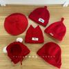 Chapéu de bebê vermelho de Ano Novo chapéu de pneu infantil homens e mulheres outono e inverno recém-nascido 0-3-6 meses linha de lã para fora