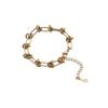 Pulsera Popular Transfronteriza Europea y Americana Personalizada de Acero de Titanio para Mujer, Lujo Accesible y Alta Gama Oro de 18K Moda Nudada Joyería de Mano de Moda
