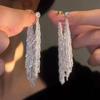 Aretes de borla de circonio de garra de alta calidad con aguja de plata 925 para mujer, temperamento de nicho de lujo ligero, aretes largos, aretes adelgazantes para rostro redondo