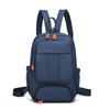 Fabricantes de bolsas de pecho cruzadas al hombro de gran capacidad personalizadas en stock mochila pequeña multihombro para viajes de negocios