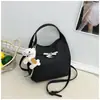 Bolso bandolera retro casual de moda, bolso de hombro simple para mujer, moda transfronteriza 2026 nuevo bolso cubo retro para el día a día