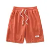 Pantalones cortos de gofre de verano transfronterizos nuevos para hombre, modernos y versátiles, adecuados para usar al aire libre, estilo juvenil simple, pantalones cortos hasta la rodilla con cordones para hombre