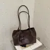 Bolsa de axila de gran capacidad Shuai Mijia para mujer 2026 Nueva moda Bolso de mano para hombro Bolso tote retro para el trabajo