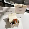 Dropshipping Bolsa Caixa Embossada de Nicho Estilo Francês 2026 Novo Modelo Primavera Bolsa Transversal Quadrada Pequena de Alto Padrão Atacado