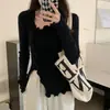 Suéter irregular de tricô pequeno estilo Chanel para outono e inverno para mulheres, com um design único, suéter fino para usar em camadas, top puro e atraente