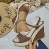 Sandalias de cuña peep-toe europeas y americanas de talla grande en stock, nuevas sandalias romanas de suela gruesa de comercio exterior transfronterizo para verano 2026 para mujer