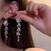 Aretes super flash de borla de hojas de diamantes completos nuevos 2025 explosión aretes largos alto sentido aretes delgados para cara redonda mujeres