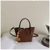 Bolsa Balde Portátil Estilo Coreano Ruien Feminina 2026 Outono Tendência Moda Alta Aparência Bolsa de Ombro para o Trabalho Bolsa Transversal