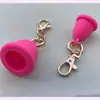 Tapa de bálsamo labial/brillo de labios de silicona con logotipo impreso personalizado, llavero, tapa de grado alimenticio, tapa de bálsamo labial portátil con clip