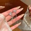 Aretes Asimétricos de Lujo Ligero con Borla de Mariposa de Piedra Ojo de Gato para Mujer Aretes Largos Elegantes de Alta Gama Aretes Explosivos