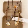 Collar de Cuerda con Colgante de Cachorro de Cerámica Lindo para Mujer Cadena Larga de Clavícula de Dibujos Animados Todo Fósforo Accesorios de Diseño de Nicho