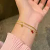 Pulsera de Hueso de Serpiente Irregular de Circonita de Cinco Colores Nueva Pulsera de Acero Inoxidable con Borla Geométrico Lujo Ligero Nicho Exquisita Joyería de Mano