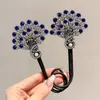 Rizador de Cabello para Moño Mágico Rizador Perezoso para el Cabello Pinza para el Cabello Azul Pluma de Alta Gama Accesorio para el Cabello para Mujeres Modelo Nuevo 2026