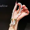Pulsera de Muñeca de Color Caramelo de Moda Pulsera Corta de Perlas Redondas con Diamantes Venta Caliente Transfronteriza Correa de Mano Antiperdida y Anticaída Estilo Caliente