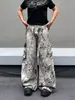 Calça jeans larga estilo patchwork de estampa de leopardo, design para primavera e outono, calça casual solta de perna reta até o chão para adolescentes