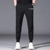 Pantalones deportivos delgados para hombre de primavera y otoño, pantalones casuales elásticos de talla grande para hombre, pantalones de trabajo, pantalones de pierna suelta modernos