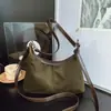 Bolsa Transversal de Alta Qualidade Estilo Retrô de Nicho Ombro Único Sob o Braço Feminina 2026 Nova Versátil para Trabalho e Deslocamento Bolsa de Ombro