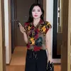 Traje de mujer de moda 2026 verano nuevo estilo, rejuvenecedor, adelgazante, camisa estampada, pantalones anchos holgados, elegante conjunto de dos piezas