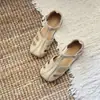 Sandalias tejidas transpirables cómodas de suela plana hueca de fondo suave 2026 sandalias retro jaula de cerdo sandalias romanas para mujer verano