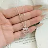 Collar con Cesta de Flores de Diamante Rosa Estilo Dulce y Lazo, Diseño de Nicho de Lujo de Alta Gama, Pendientes Versátiles para Mujer
