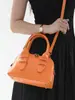 Shuai Mi Jia Simple Retro Casual 2026 Verano Nuevo Bolso Cruzado de Hombro Único con Forma de Concha para Mujer
