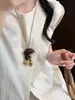 Nuevo collar colgante de pez de palisandro estilo chino, estilo étnico vintage, cadena larga versátil para suéter, accesorio de diseñador para mujer