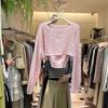 Traje de punto calado corto 2024 Primavera y Otoño Nuevo Vacaciones Coreano Camisa delgada protectora del sol Conjunto de dos piezas