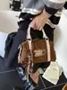 Bolso de Mano Moderno y Elegante Tipo Bolsa Almohada para Mujer 2026 Nueva Moda Versátil para el Trabajo Cruzado Pequeño Bolso Tote
