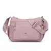 Bolsa de nailon multibolsillos, diseño simple, colección otoño/invierno 2026, bolso de hombro/bolso cruzado color ámbar estilo coreano, bolso cuadrado pequeño